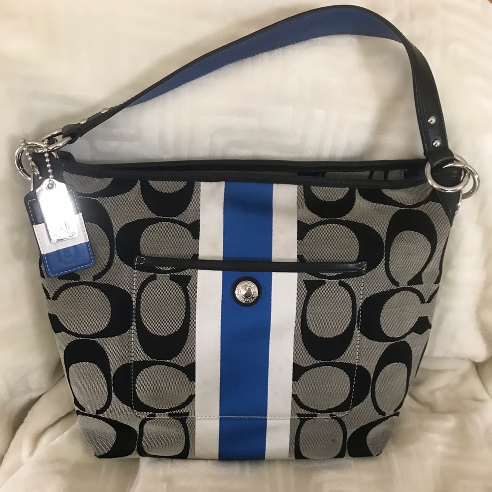 Authentic Coach pocketbook.